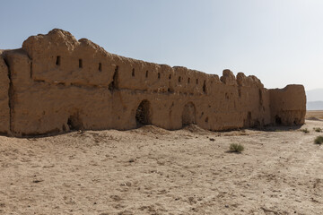 Ancient mud brick wall of a caravanserai in the desert of Balkh Province, Afghanistan