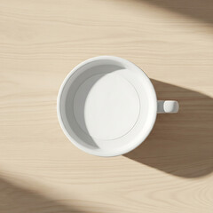 Overhead View of White Ceramic Mug on Light Wooden Table with Natural Shadows