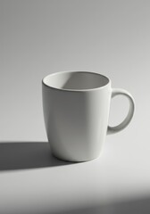 Obraz premium Minimalist White Mug on a Light Surface