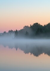 Fototapeta premium Serene Lakeside Forest at Dawn with Mist