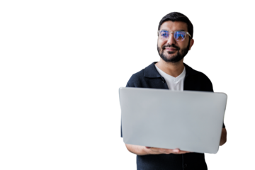 Man engages with laptop, showcasing creativity and focus.