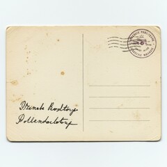 Vintage postcard back with handwritten address and faded postmark.