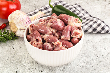 Fresh raw chicken hearts in the bowl