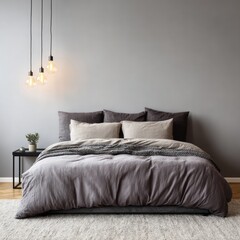 A stylish bedroom, featuring a large bed with a cozy gray duvet cover, neutral-toned bedding, and modern pendant lights, creates a serene and inviting atmosphere.