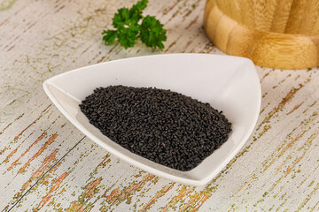 Black dry Nigella seeds in the bowl