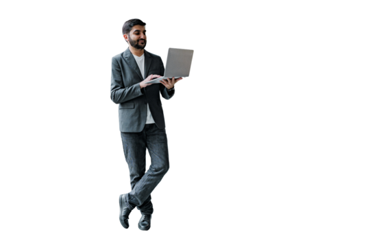 Businessman using a laptop symbolizes modern work life.