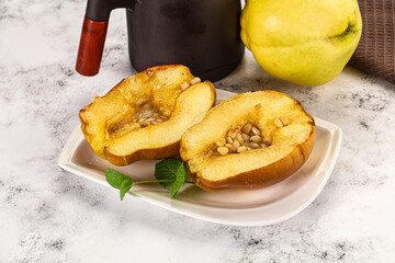 Baked quince with honey and cedar