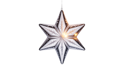 A shimmering decorative star in the dark.