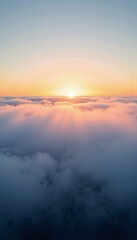 Fototapeta premium Breathtaking Sunrise Emerging Above Soft Clouds in a Serene Sky Capturing the Beauty and Tranquility of Natural Light in a Calming Atmosphere