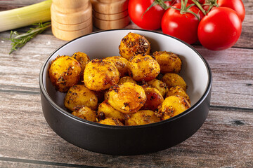 Baked small baby potato with herbs