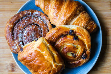 Selection Of Baked Danish Breakfast Pastries Croissant, Cinnamon Swirl, Pain Au Raisin, Choc Au Pain