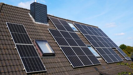 Fototapeta premium Photovoltaic modules generate clean energy on the roof of a residential home