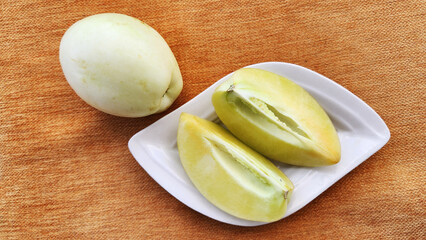 Pepino (Solanum muricatum) is a fruit native to the Andes region of South America, known for its flavor resembling melon and cucumber, and also called 