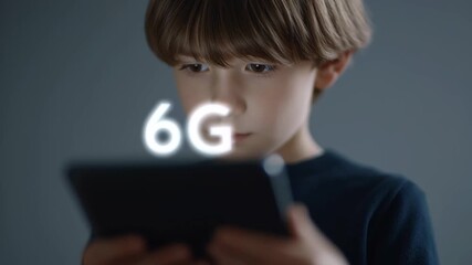 Child using digital tablet with glowing 6G symbol showcasing futuristic technology innovation and hologram display for advanced communication - Powered by Adobe