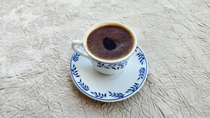 A cup of Turkish coffee, a traditional preffered beverage for conversation and relaxation