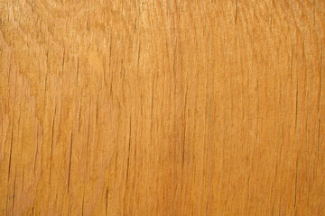 Naklejka premium A photo of the texture of light wood with small cracks.The texture of an old wooden background.