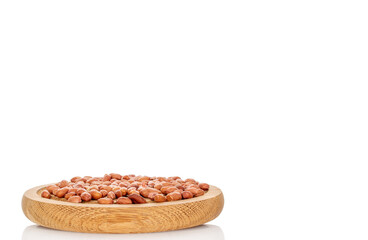 Peeled raw peanuts isolated on white background, close-up.