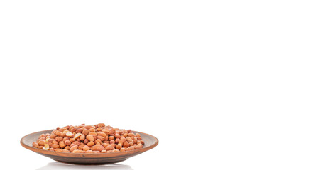 Peeled raw peanuts isolated on white background, close-up.