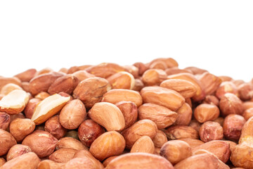 Peeled raw peanuts isolated on white background, close-up.