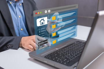 A person interacts with a futuristic laptop displaying a holographic interface, showcasing digital folders and options.