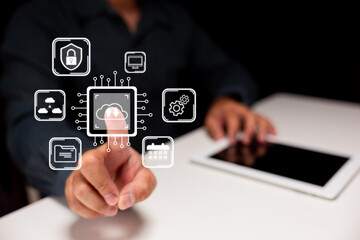 A person interacts with digital icons representing cloud computing, security, and technology on a touchscreen interface.