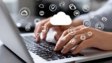 A close-up of hands typing on a laptop keyboard with cloud computing icons in the background, representing digital connectivity and modern technology in everyday life.