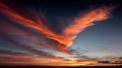 Obraz premium Dramatic fiery orange sunset cloud swirling with chilired embers against dark sky creating vibrant, intense atmospheric energy with copy space on right side