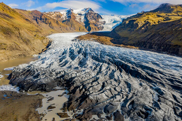 Drone view of Sv&iacute;nafellsj&ouml;kull glacier tongue and proglacial lake in Iceland