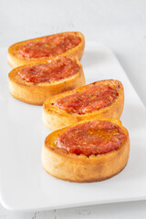 Traditional Pan con Tomate Sandwiches Served on White Plate with Rustic Style
