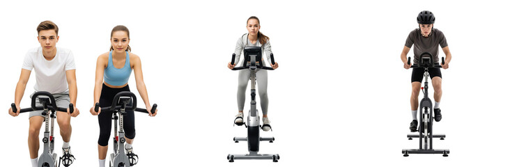 A diverse group of active young men and women participating in an indoor cycling cardio workout on stationary bikes for health and fitness training