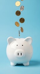 Watch Your Savings Grow With Coins Dropping Into A Cheerful White Piggy Bank Against A Bright Blue Backdrop