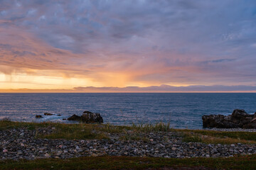 Russia, Murmansk region, Rybachy Peninsula. Sunset on the Barents Sea coast. August 2025
