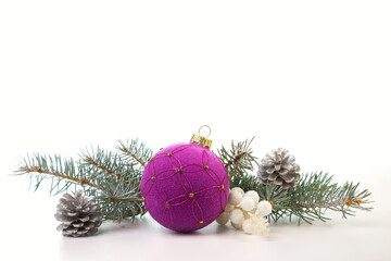 Christmas card with fir branches and Christmas decorations. Copy space