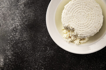Cottage cheese fermented milk product portion size natural product tasty snack fresh delicious gourmet food background on the table rustic top view copy space keto and paleo diet