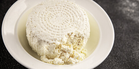 Cottage cheese fermented milk product portion size natural product tasty snack fresh delicious gourmet food background on the table rustic top view copy space keto and paleo diet