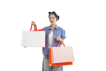 Shopping spree, woman holds shopping bag: An Asian woman, radiating confidence and joy, proudly showcases the spoils of a successful shopping trip.