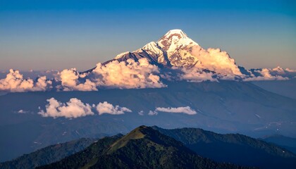 Majestic mountain peak, clouds, and valley