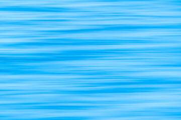 Abstraktes blaues Wasser mit sanften Wellen