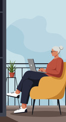Senior woman working on a laptop from her apartment balcony, enjoying remote work and a relaxed lifestyle. Ideal for business, tech, or retirement concepts.