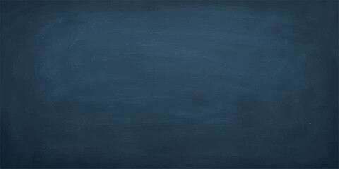 A textured blue blackboard with chalk is a blank canvas for design