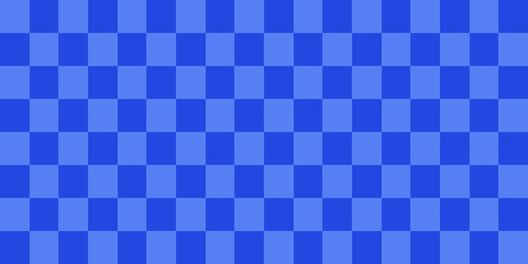 Fototapeta premium Deep blue checkerboard background filling the frame, smooth and consistent grid-like pattern, giving a bold, modern, and minimal aesthetic suitable for graphic decoration.
