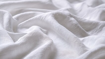 Close-up of soft white fabric draped in folds