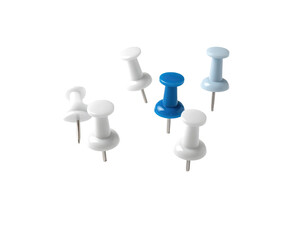 Assorted pushpins, various shades of white and a single blue pin, clustered together