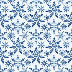 Winter seamless festive background with snowflakes of different shapes. Christmas, New year, winter holidays theme. Design template for banner, greeting card, web, print.