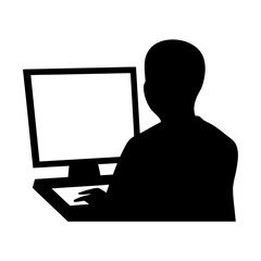 Person working on a computer screen in a black silhouette