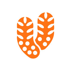 Two orange leaf shapes with black dots isolated on transparent background