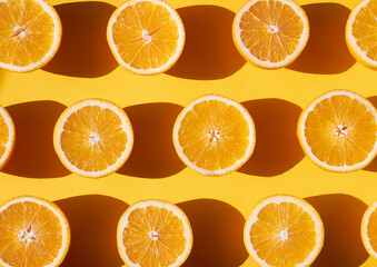 Obraz premium Orange fruits on a orange back