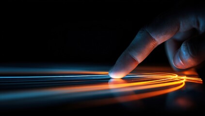 A fingertip touches a glowing, swirling surface