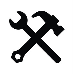 Black silhouette of a crossed wrench and hammer on a white background