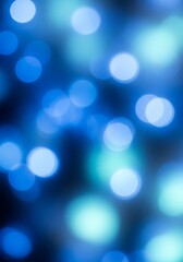 Abstract design of vibrant blue and teal bokeh lights, showcasing a captivating blend of colors.